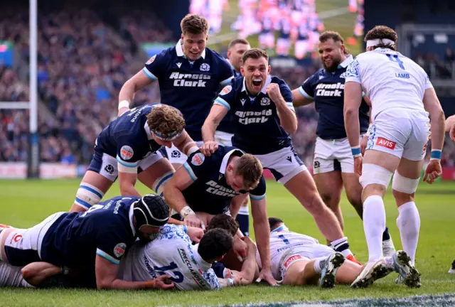 Rory Darge celebrates a try