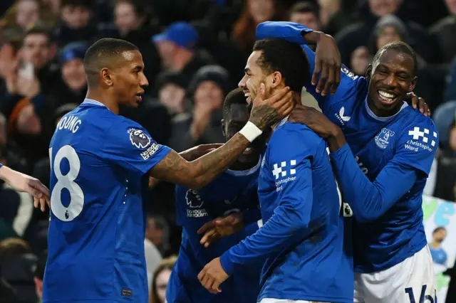 Everton players celebrate with NDiaye after their fourth goal