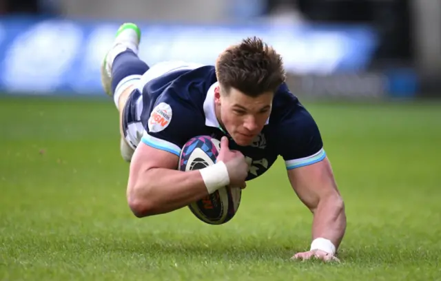 Huw Jones scores a try