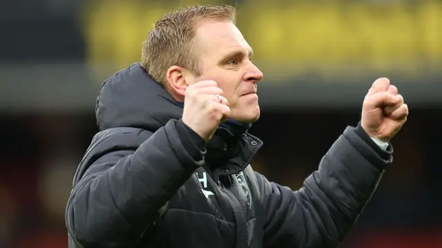 Norwich manager Johannes Hoff Thorup celebrates at full-time