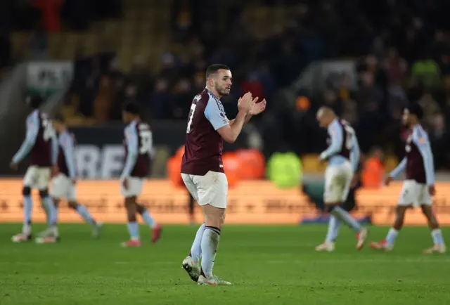 McGinn claps the away fans