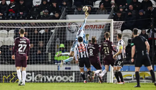 St Mirren's Zach Hemming saves a free kick from Hearts' James Penrice