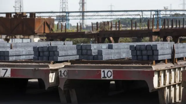 Rows of steel rectangles on a different platforms