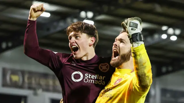 Penrice celebrates with Hearts' hero Craig Gordon