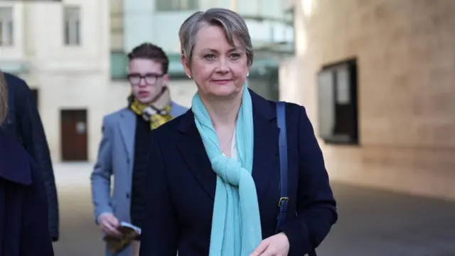 Home Secretary Yvette Cooper in blazer and blue scarf outside BBC Broadcasting House