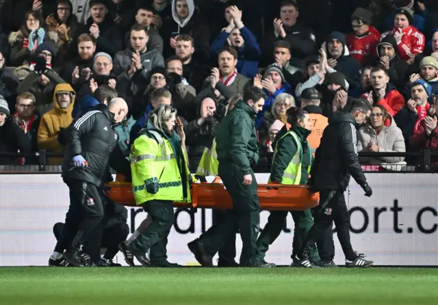 Taiwo Awoniyi is stretchered off