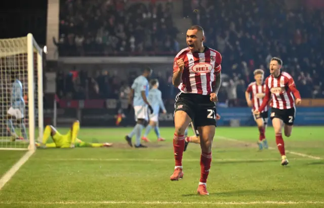 Josh Magennis celebrates