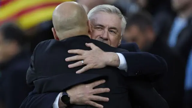 Carlo Ancelotti hugs Pep Guardiola