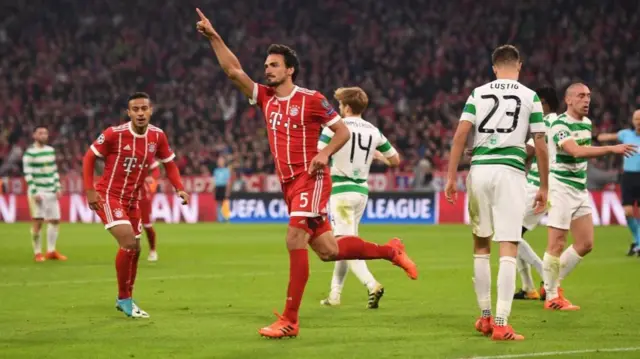 Mats Hummels celebrates scoring against Celtic in the Champions League.