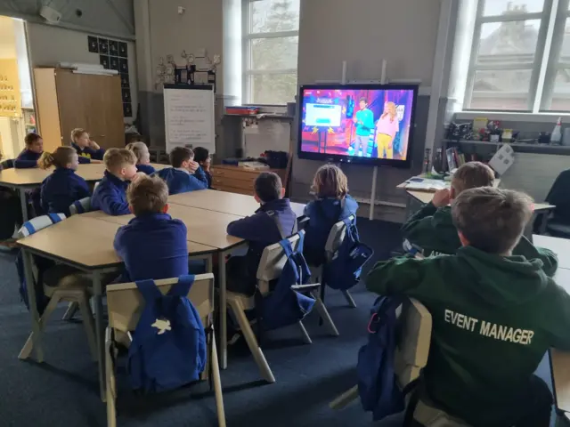 A photograph of pupils from Grandtully Primary School Class watching the Live lesson for Safer Internet Day