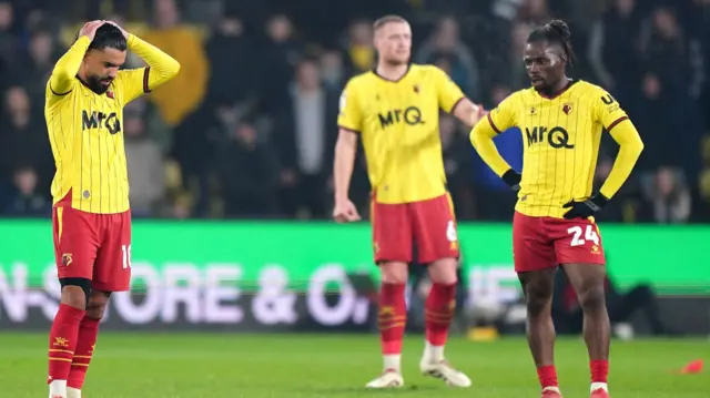 Watford players react after going down 3-0 to Leeds at Vicarage Road