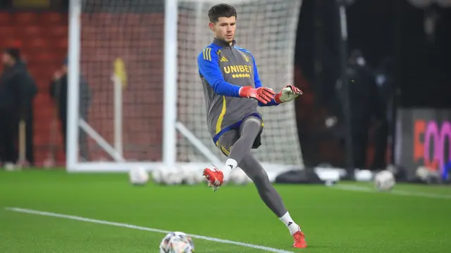 Leeds goalkeeper Illan Meslier warms up at Vicarage Road