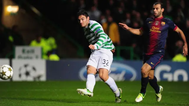 Tony Watt scores against Barcelona for Celtic in the Champions League.