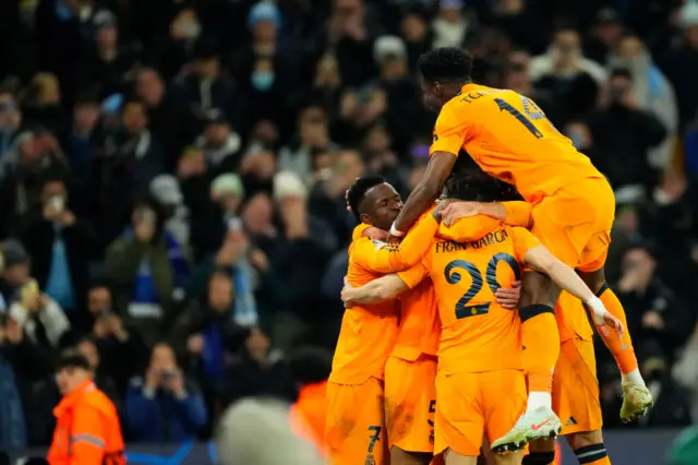 Madrid players celebrate the goal