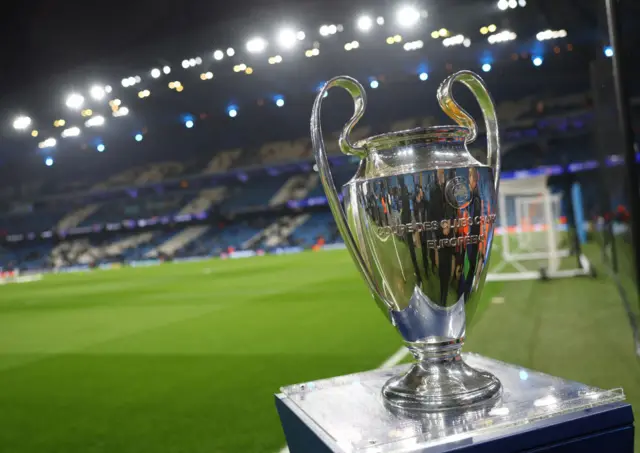 UCL trophy stands pitchside