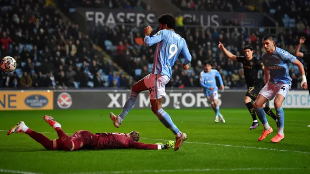 QPR keeper Paul Nardi saves at the feet of Ellis Simms