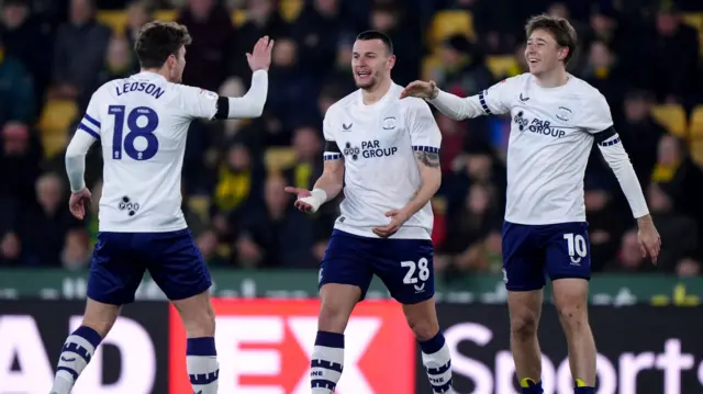 Ryan Ledson celebrates with Preston goalscorer Milutin Osmajic