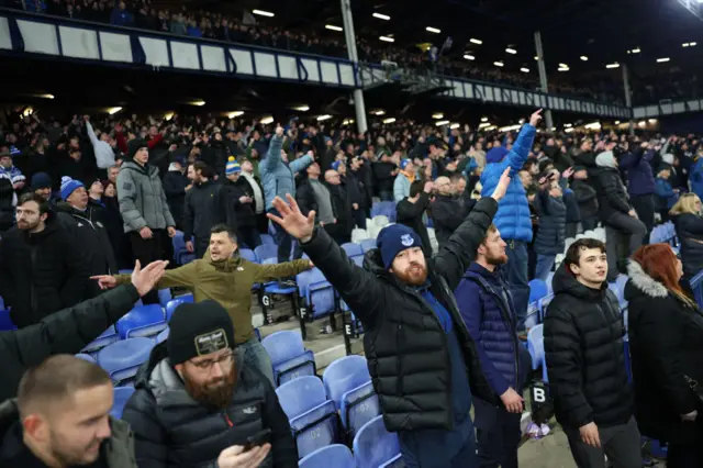 Everton fans celebrate at full time