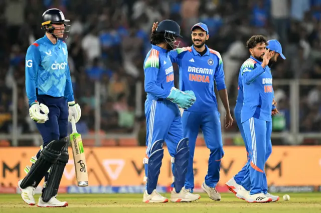 Kuldeep Yadav and India celebrate the wicket of England's Tom Banton