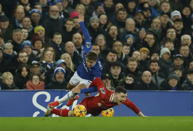 Jesper Lindstrom and Andy Robertson clash