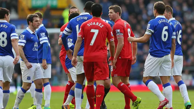 Things get heated between Liverpool and Everton players in the Merseyside derby at Goodison Park, 2013