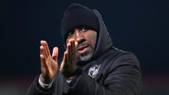 Darren Moore applauding Port Vale fans