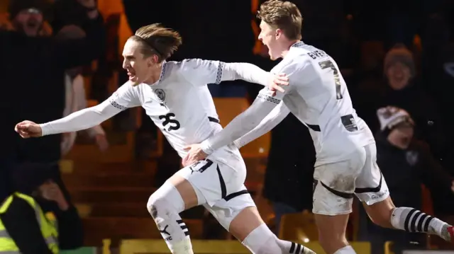 Ronan Curtis celebrates