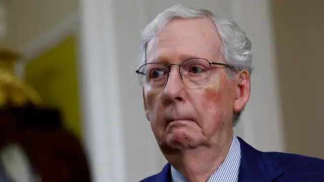 Headshot of Mitch McConnell, background is blurred