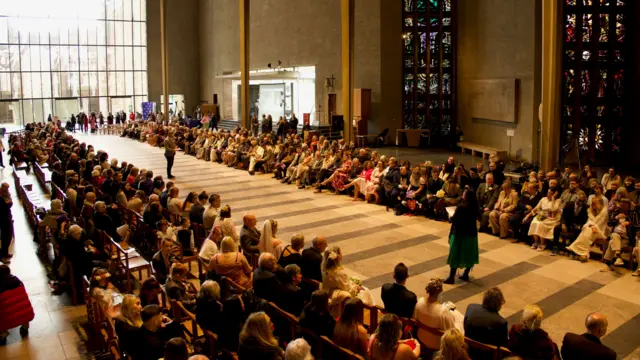 Rows of couples at Coventry Cathedral