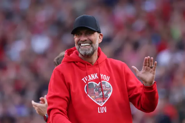 Jurgen Klopp claps the Liverpool fans