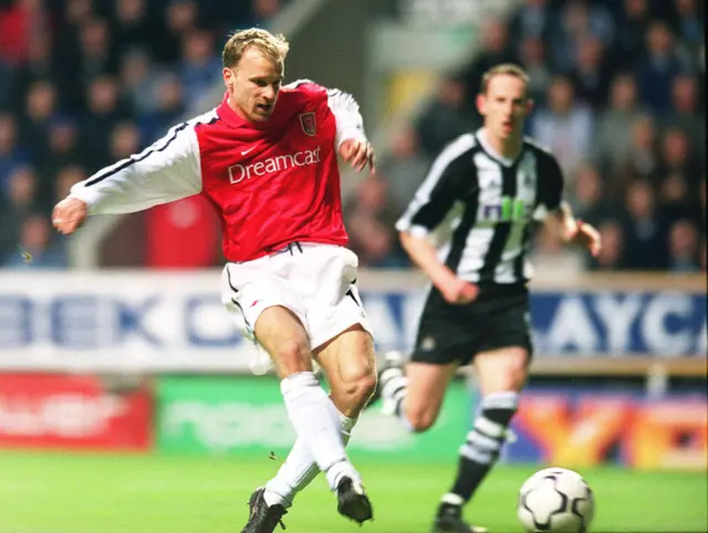 Dennis Bergkamp scores a goal for Arsenal during the Premier League match against Newcastle United on March 2, 2002