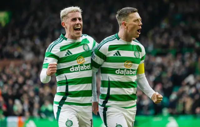 Celtic's Callum McGregor (R) celebrates scoring to make it 1-0 with teammate Luke McCowan during a William Hill Premiership match between Celtic and Dundee United at Celtic Park, on February 15, 2025, in Glasgow, Scotland. (Photo by Craig Foy / SNS Group)