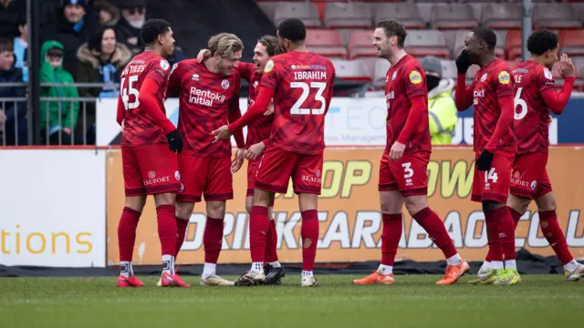 Crawley players celebrate