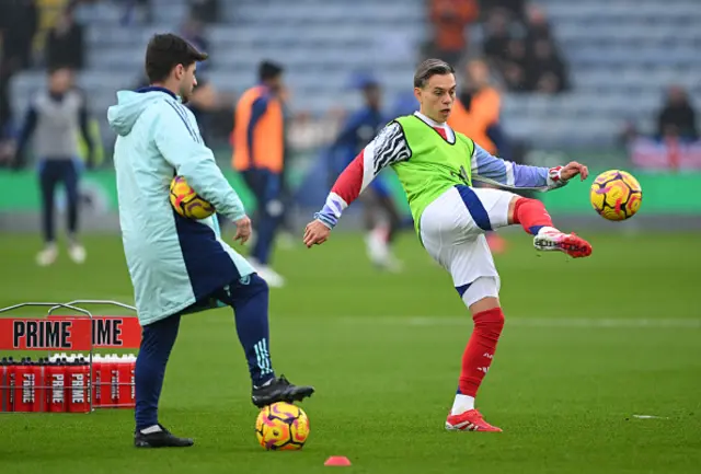 Leandro Trossard from Arsenal warms up