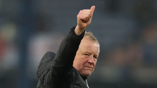 Chris Wilder gives the thumbs up to Sheff Utd supporters after the game at Luton