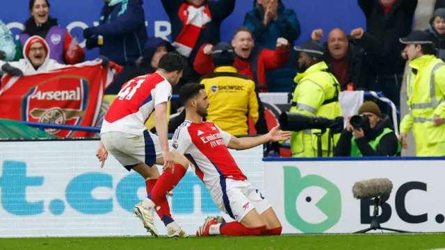 Arsenal's Mikel Merino celebrates scoring their first goal with Declan Rice