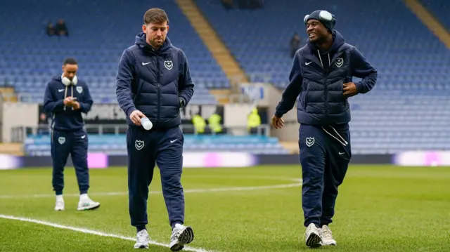 Portsmouth players at the Kassam Stadium