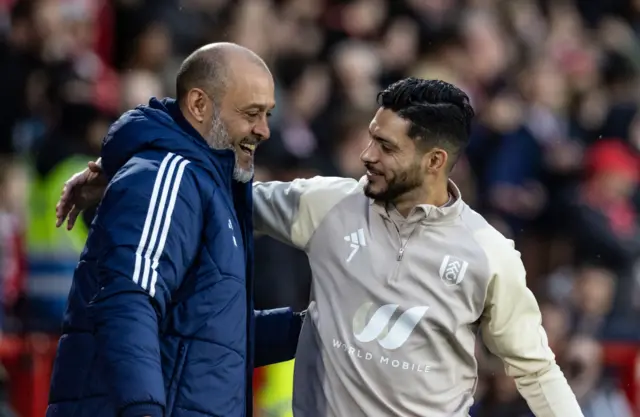 Nottingham Forest's Nuno Espirito Santo greets Fulham's Raul Jimenez