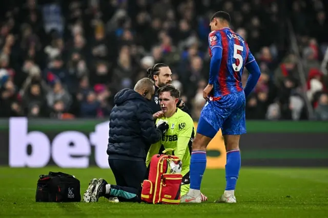 Dean Henderson with medical staff