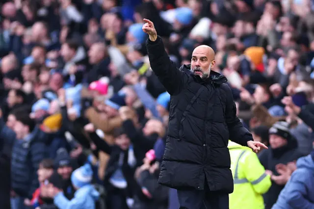 Pep Guardiola manager of Manchester City celebrates