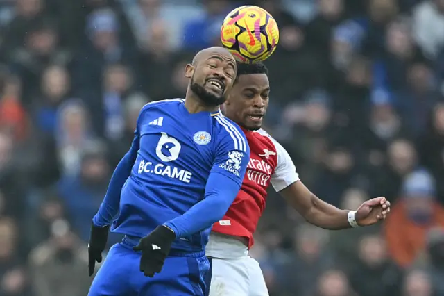 Jordan Ayew (L) vies with Arsenal's Dutch defender Jurrien Timber