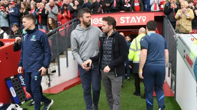 Michael Carrick and Tom Cleverley shake hands ahead of Boro v Watford last May