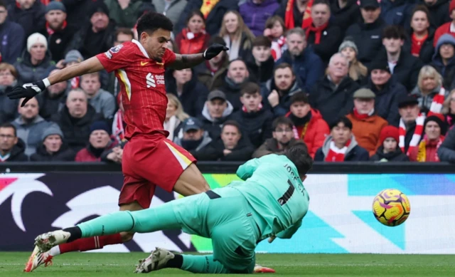 Wolverhampton Wanderers' Jose Sa fouls Liverpool's Luis Diaz to concede a penalty