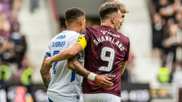 Rangers captain James Tavernier and Hearts skipper Lawrence Shankland