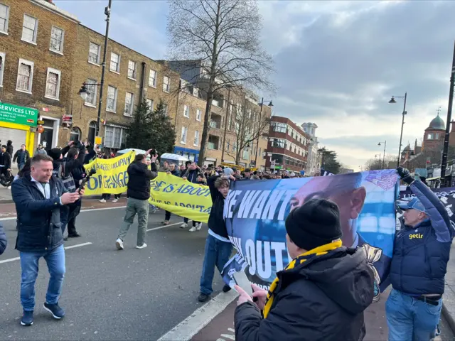 Pre-match anti-ownership protests from a group of Tottenham fans