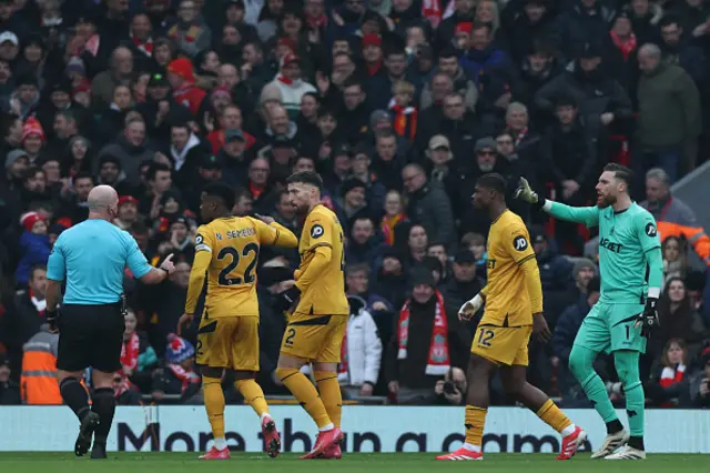 Jose Sa (R) appeals to English referee Simon Hooper