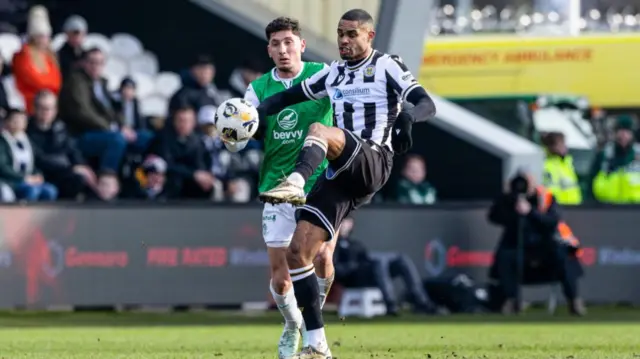 Hibernian's Nectar Triantis and St Mirren's Mikael Mandron