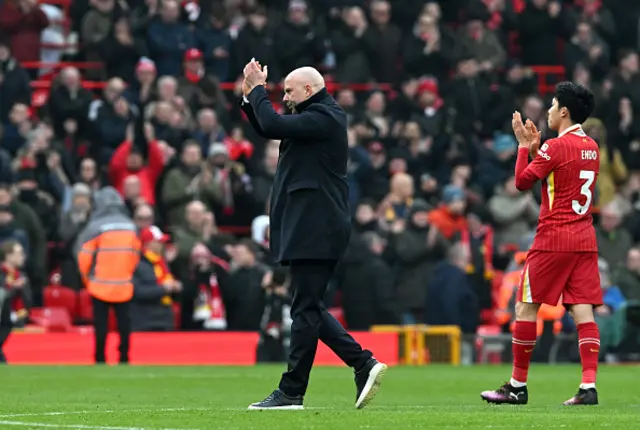 Arne Slot, Manger of Liverpool applauds the fans