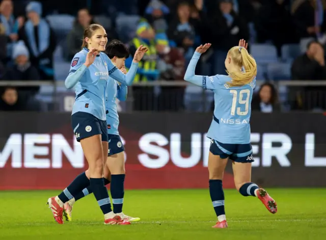 Manchester City's Gracie Prior celebrates scoring their fourth goal.