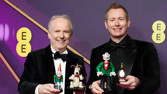 Wallace and Gromit creator Nick Park with Merlin Crossingham at the Baftas